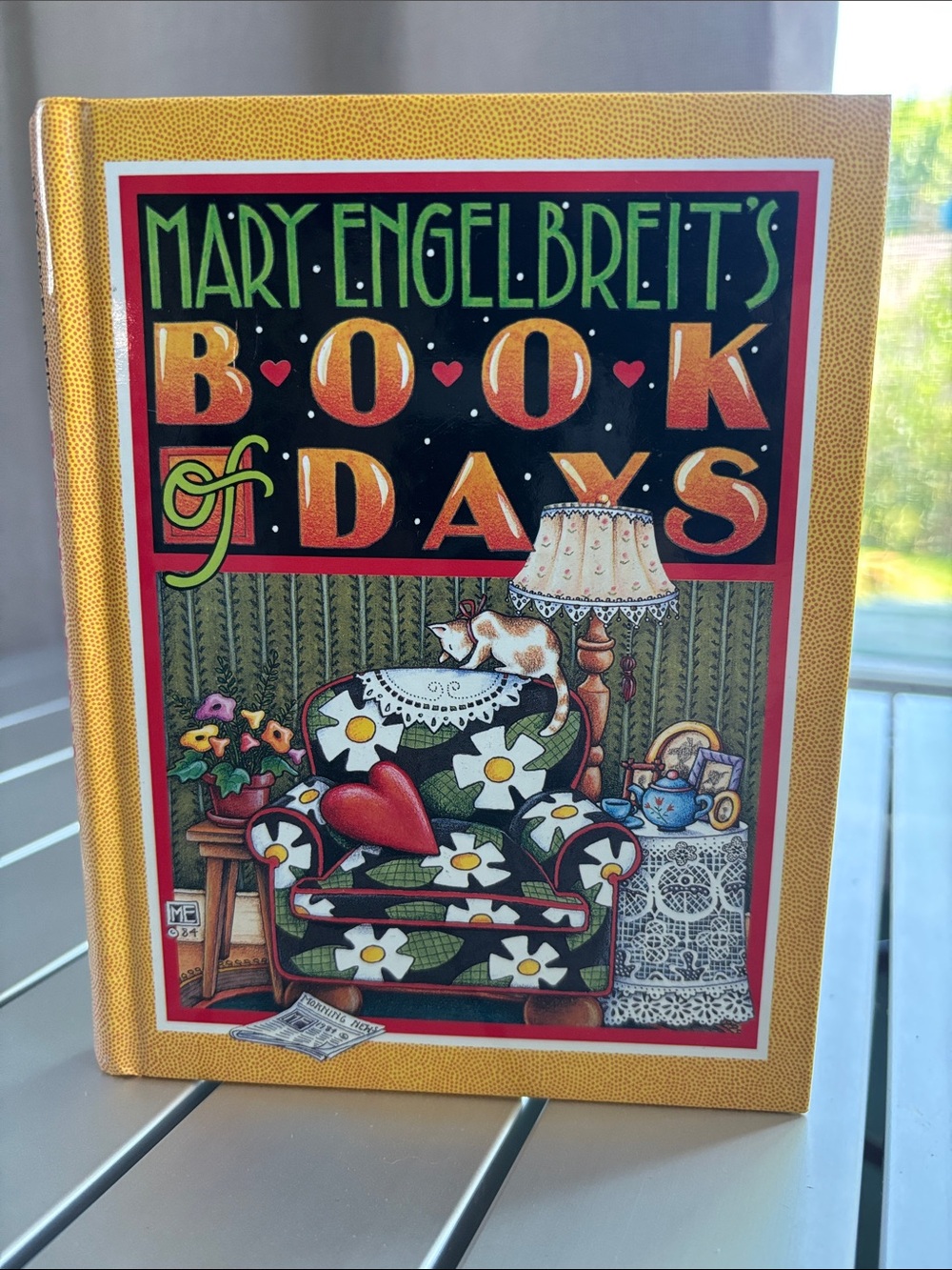 Mary Engelbreit Hardcover Book with Gold and Green Illustrated Cover